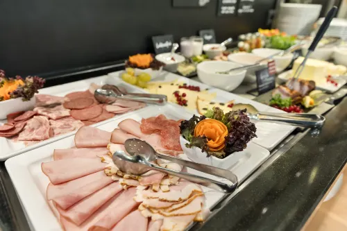 Hotel Rathauspark Wien, a member of Radisson Individuals Dining Photos