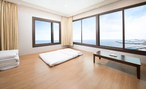 Palace Hotel Jeju Zimmer Photos