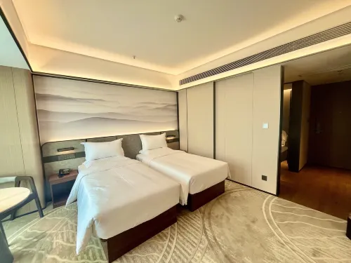 Duole Holiday Hotel (Shanghai Hulan Road Subway Station Branch) Kamar Photos