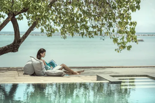 Four Seasons Resort Maldives at Landaa Giraavaru Zimmer Photos