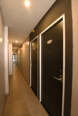 Mira Inn Rungkut Zimmer Photos