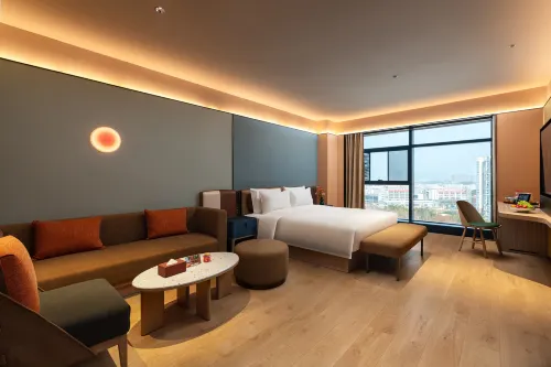 Orange Hotel Kamar Photos
