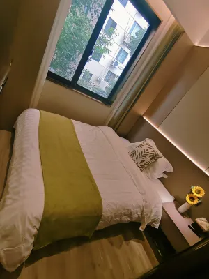 홍쥔·징신 비즈니스 아파트호텔 （상하이바오산루지하철역 ） Photos