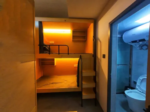 โฮสเทลสำหรับผู้เยาว์นวนจู่ (สถานีกีฬากว่างโจว ลินเหอซี) ห้องพัก  Photos