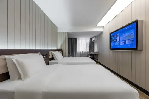 HanTing Hotel (Shanghai Qiantan Shangnan Road Subway Station) Huoneet Photos