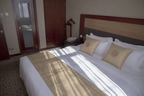 Qianmen Jianguo Hotel Zimmer Photos