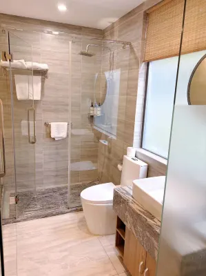 Yun He Ye Bo Hotel (Wuxi Lingshan Grand Buddha Nianhua Bay) Kamar Photos