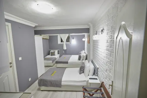 Unique Suite Hotel Chambres Photos