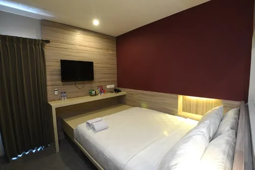 Mira Inn Rungkut Zimmer Photos