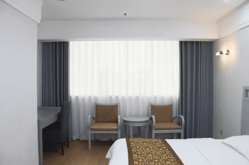 The Grand Tower Hotel Zimmer Photos