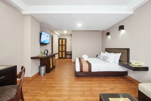 Grand Santhi Hotel Kamar Photos