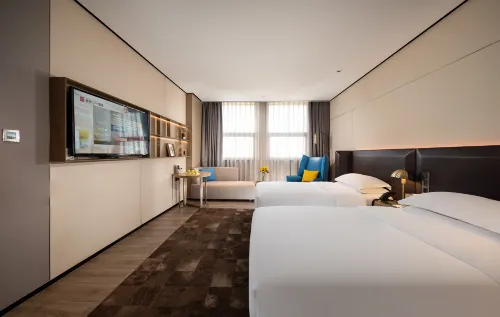 Echarm Plus Hotel (Wuxi Changjiang North Road Taihu Garden Metro Station) Kamar Photos