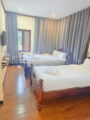 We House Guest House Kamar Photos