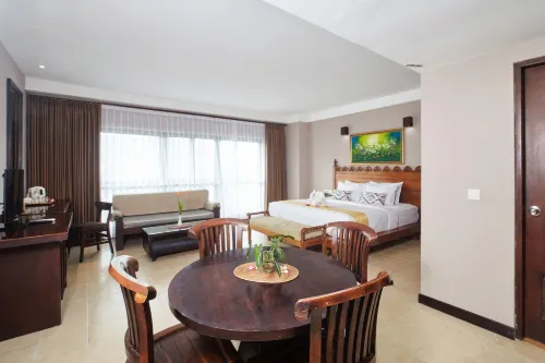 Grand Santhi Hotel Kamar Photos