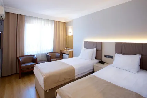 Grand Ant Hotel Rooms Photos