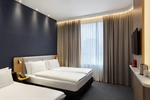 Holiday Inn Express Munich City West Rooms Photos