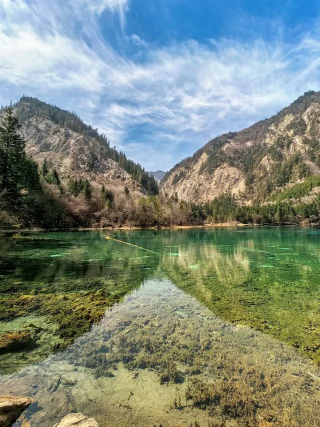 Water cascading over travertine terraces in Jiuzhaigou