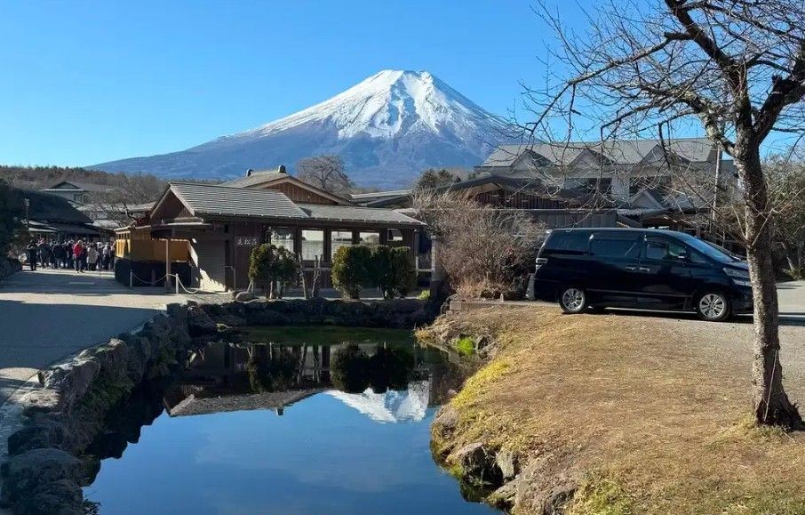 Car rental and canal with mount Fuji View