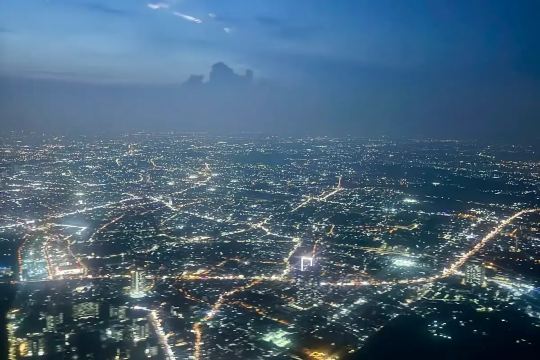 Aerial view of Singapore’s illuminated cityscape at night