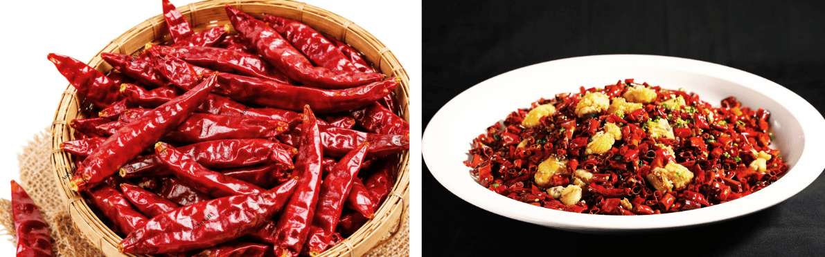 Cesto di peperoncini essiccati accanto a un piatto di pollo piccante in stile Sichuan con abbondante peperoncino a pezzetti
