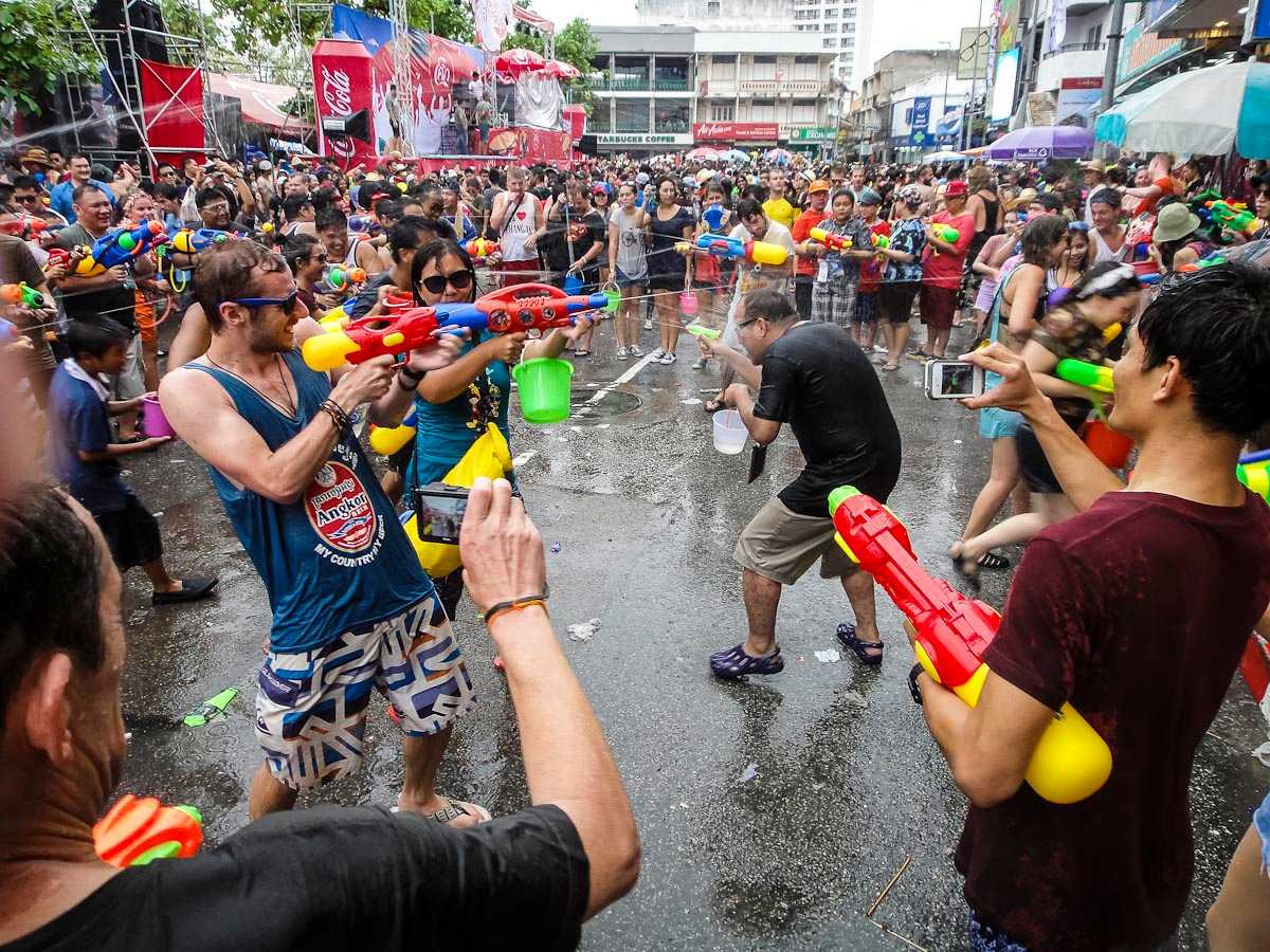 A celebration of Songkran where locals and tourists alike are shooting water at each other with water guns