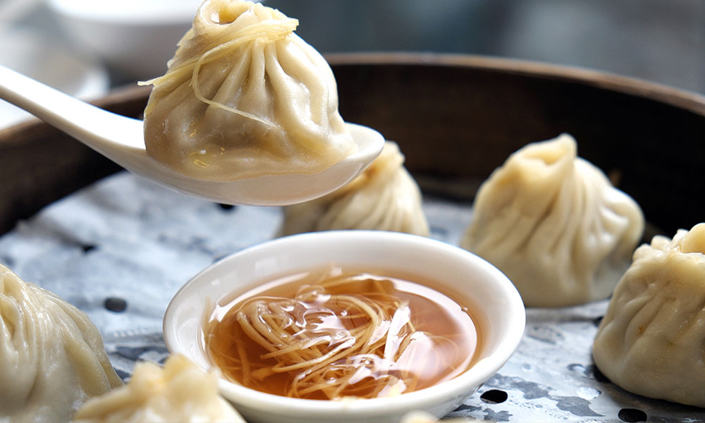 A bunch of xiao long bao dumplings