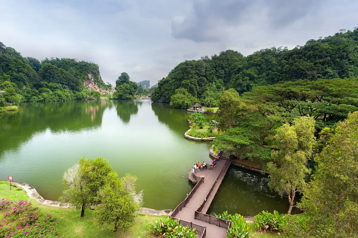 Scenic lakeside park from the opposite angle, showing the trees and ambiance