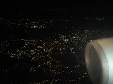 Nighttime aerial view of Orlando from an airplane