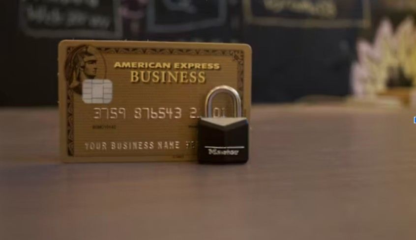 A lock in front of a American Express card