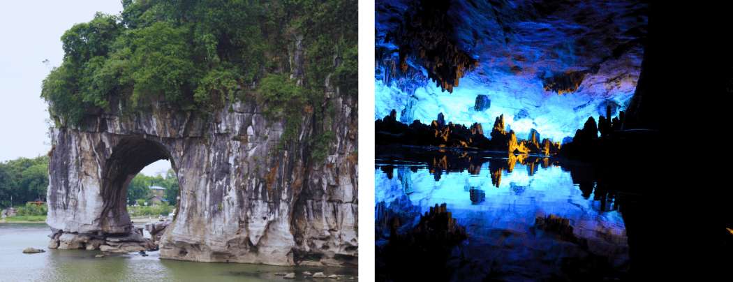 Das Innere der Schilfrohrflöten-Höhle in Guilin mit beleuchteten Stalaktiten und Stalagmiten, die sich in einem unterirdischen See spiegeln