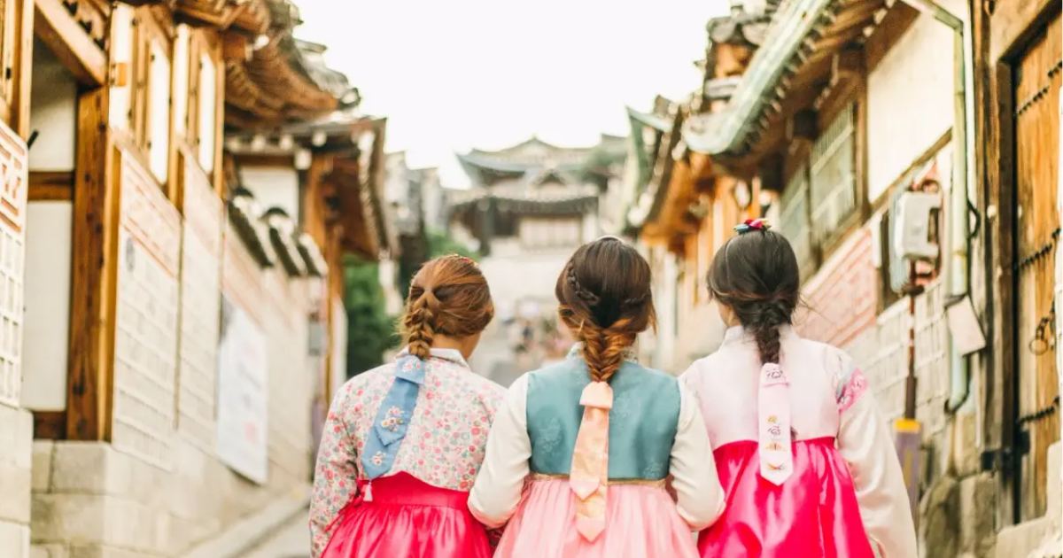  walking along streets in Hanbok