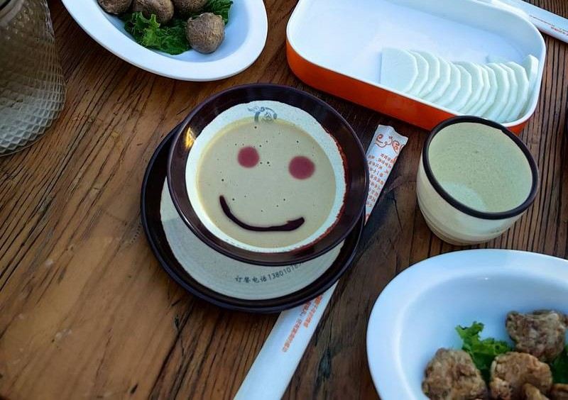 Traditional Beijing breakfast with savory dumplings and tea
