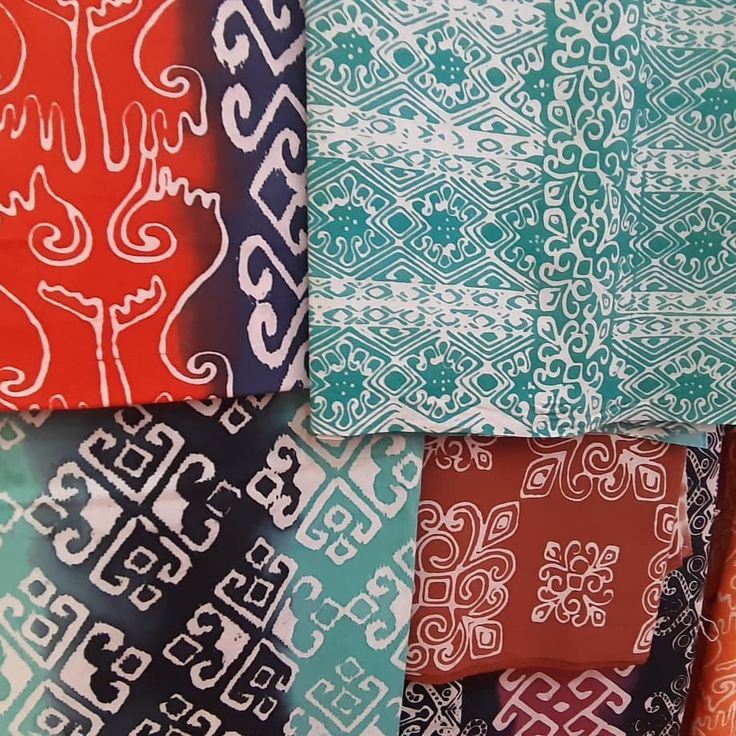 A bunch of batik cloth with different patterns