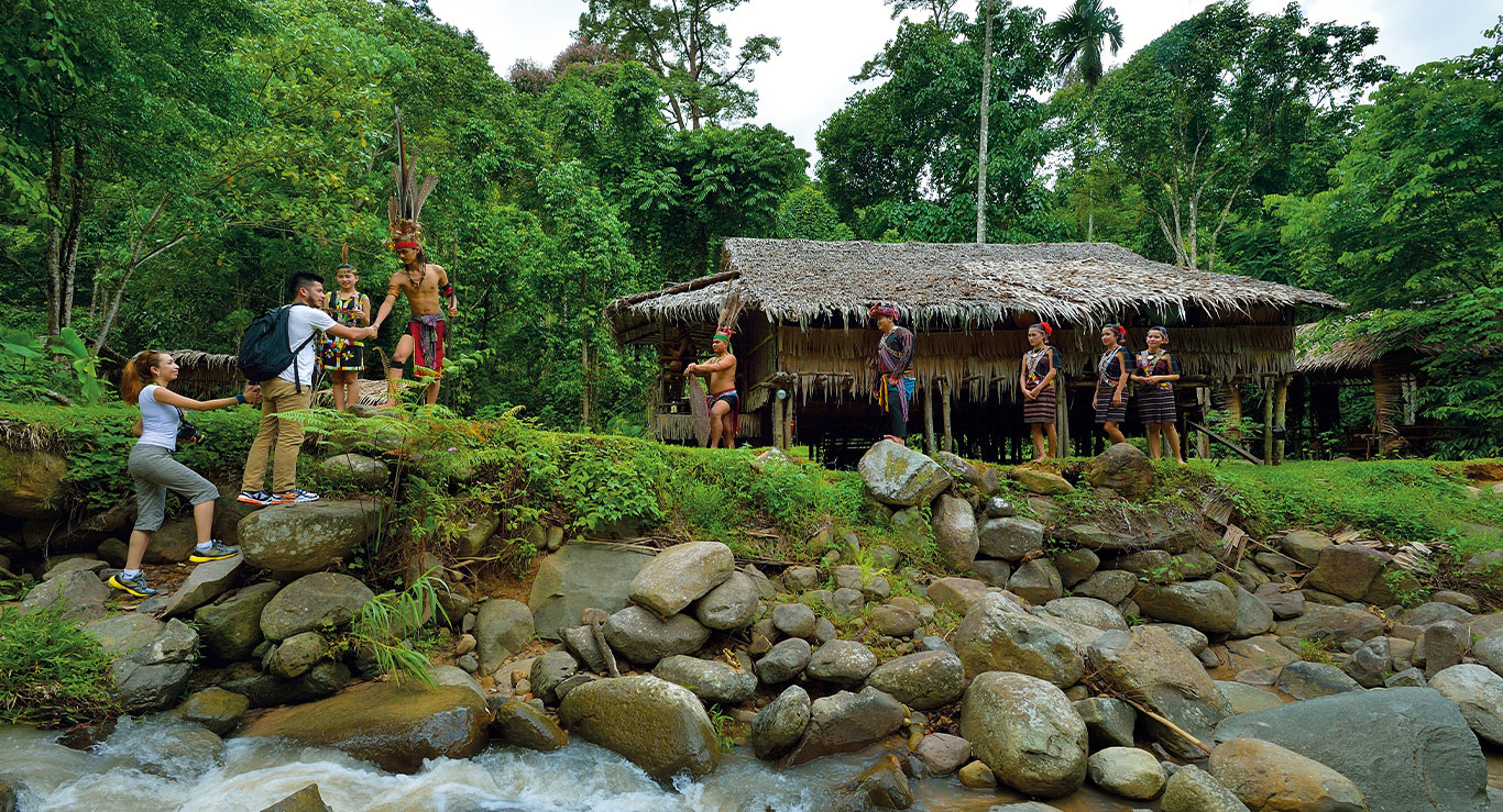Tourist greeting villagers in the Mari Mari Village