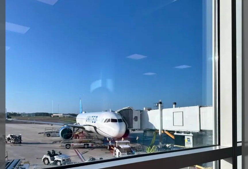 Passenger airplane parked at a gate at Orlando International Airport