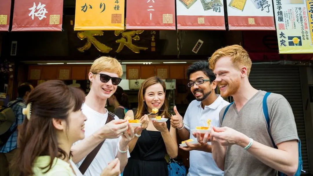 visitors enjoying food at Tsukiji Outer Market