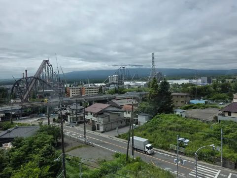 Fuji-Q Highland roller coasters with Mount Fuji in the background