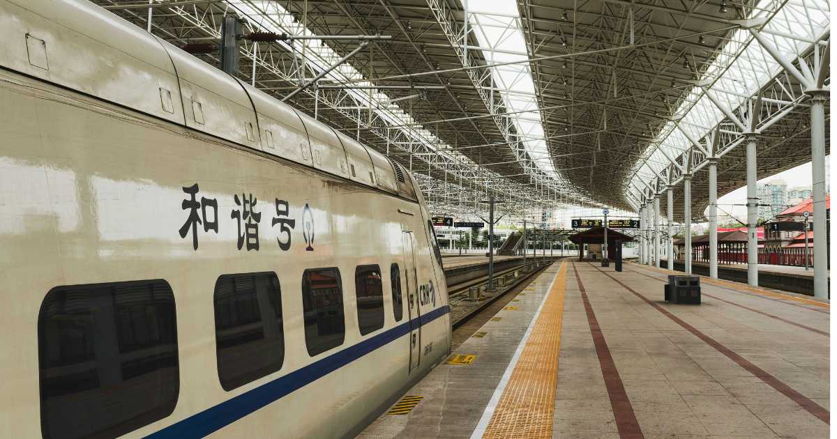 China high speed train stopped at a railway station platform