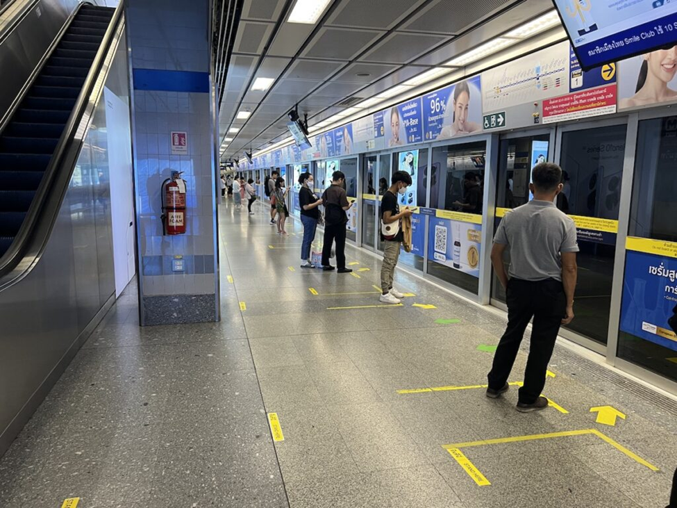 The interior of a semi-busy MRT station in Bangkok