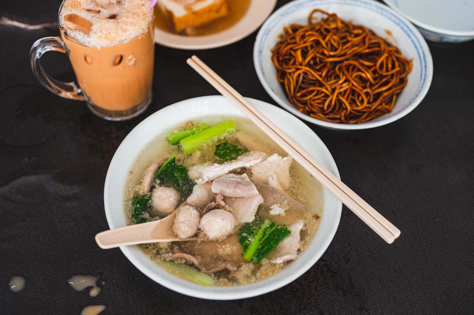 A delicious spread of noodles and pork balls