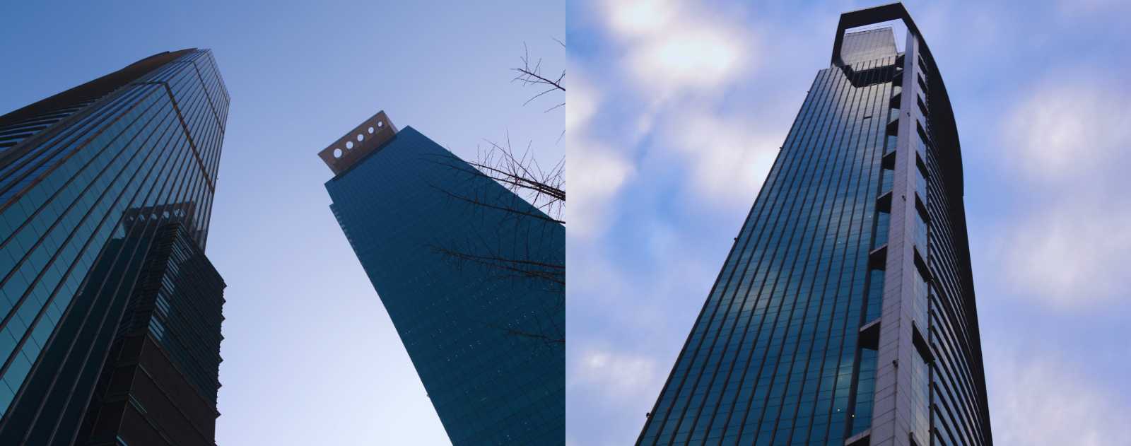 Rascacielos modernos de cristal en una gran ciudad china vistos desde perspectiva baja