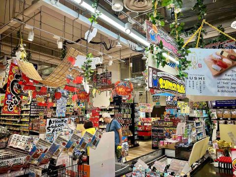 Colorful Japanese food displays inside a Donki store