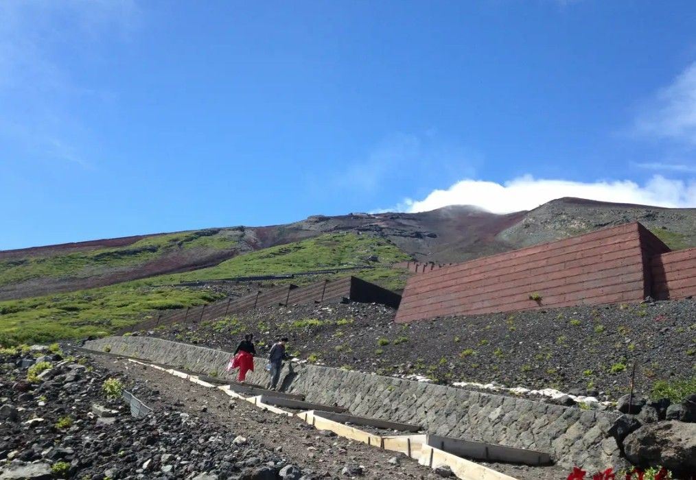 Visitors walking along the Mount Fuji Fifth Station hiking trail