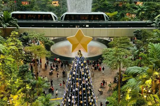 Christmas tree and the HSBC Rain Vortex waterfall at Jewel Changi Airport