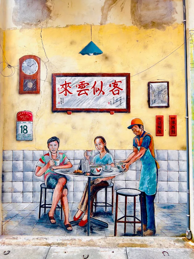 Wall art of Kopitiam customers enjoying their time