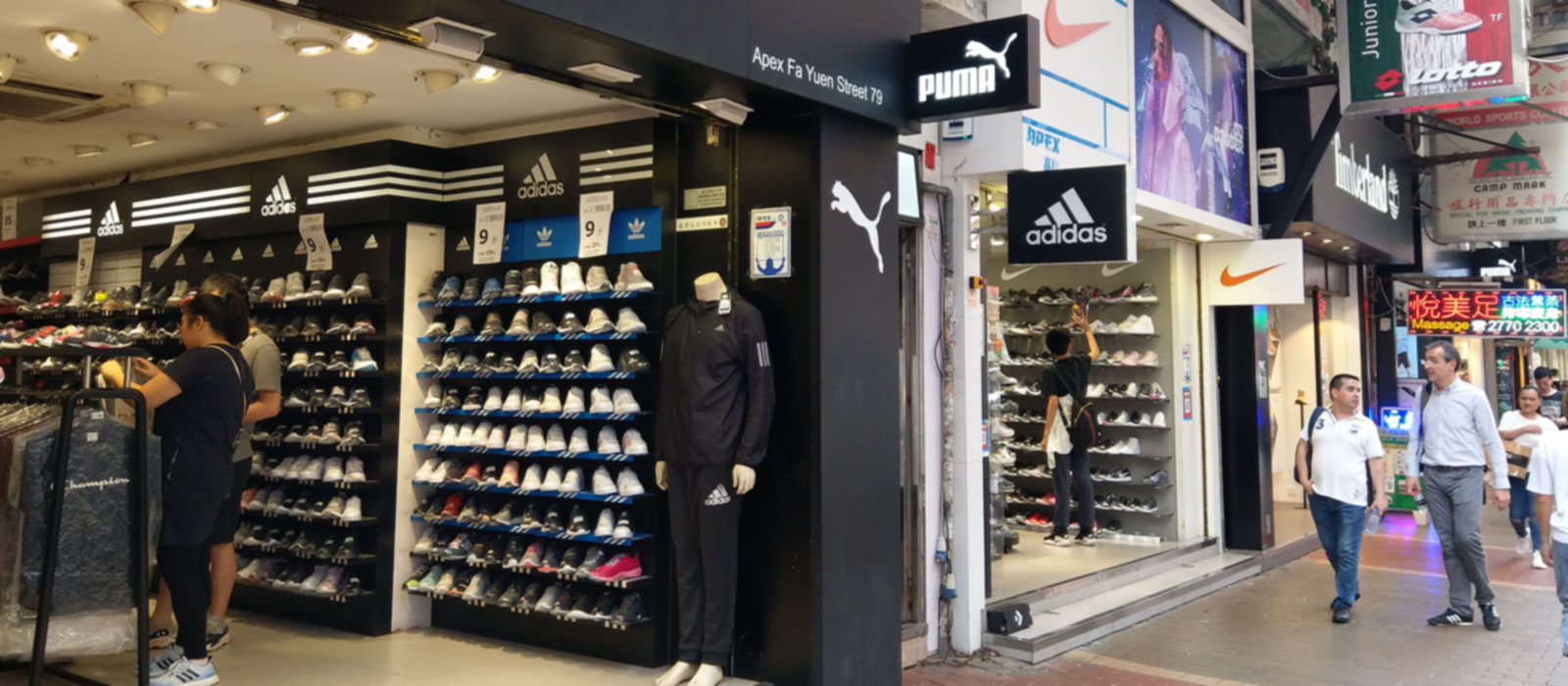 Image of sneaker street, rows of shoe shops