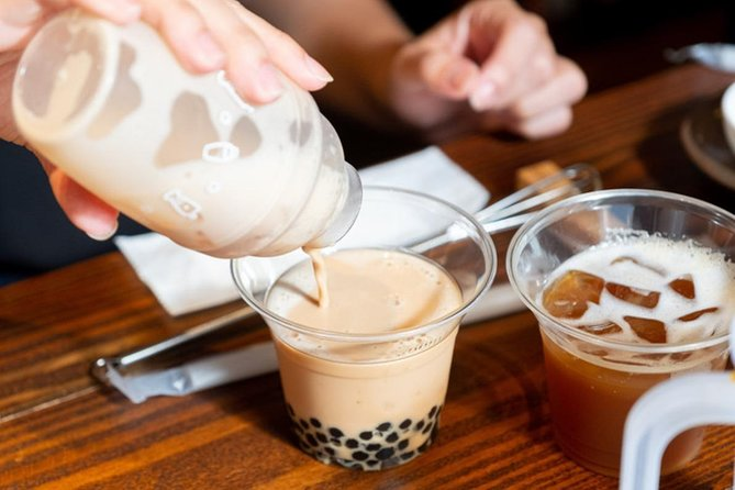 Someone making their own bubble tea