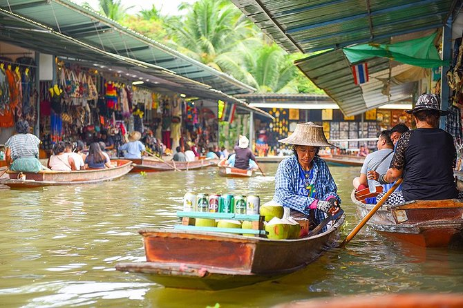 A lady selling fruits and vegetables on a boat by the river