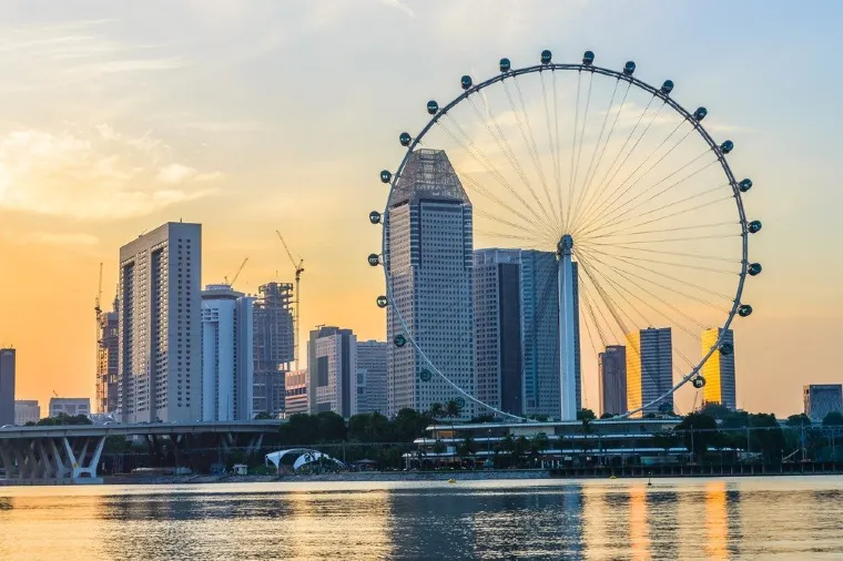 scene of singapore flyer at sunset