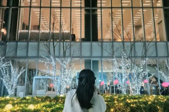 Traveler enjoying Osaka city lights at night